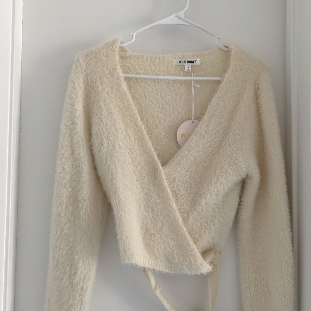Nylon off white or cream sweater or cardigan; feels soft like cashmere